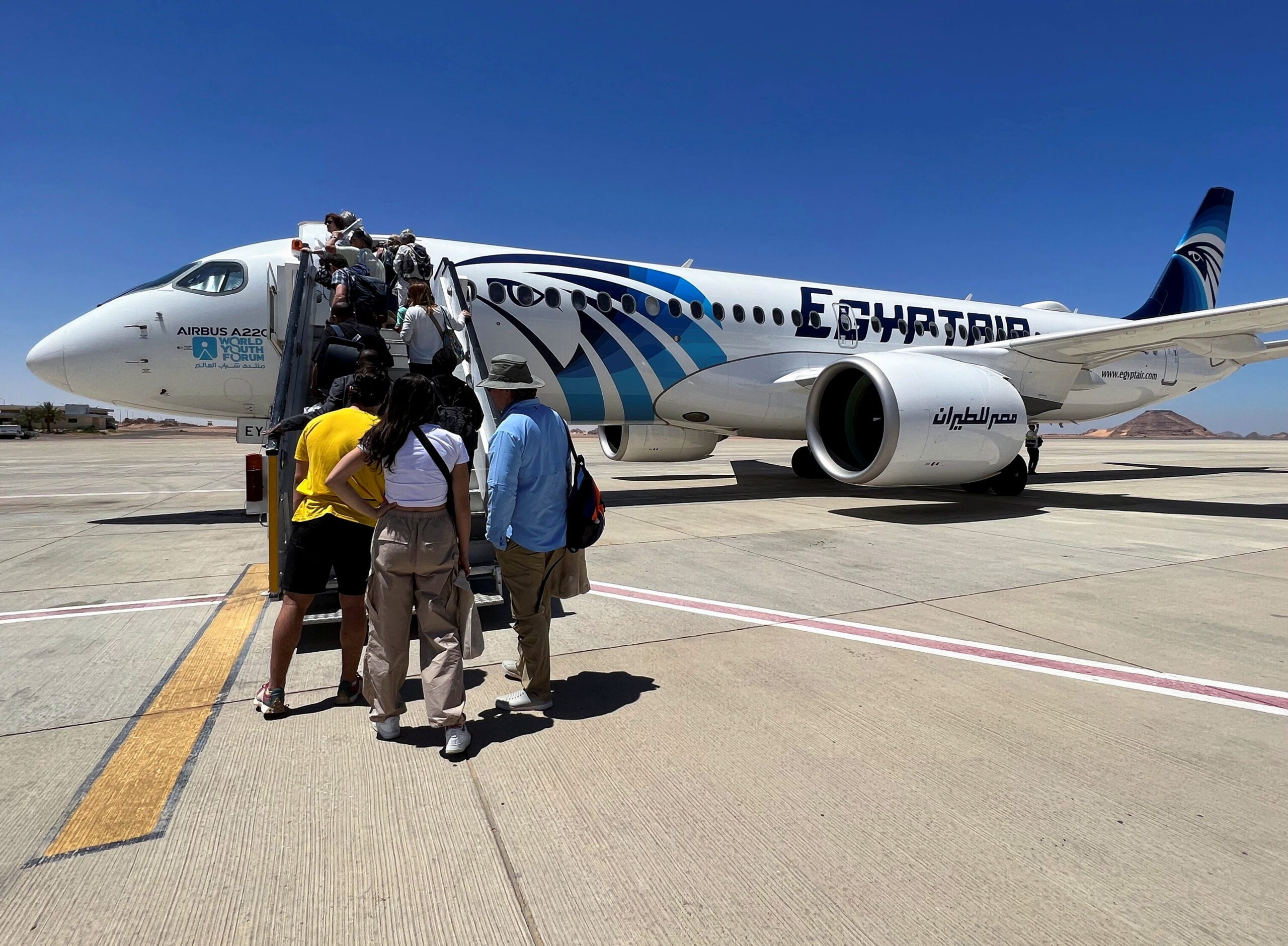 Tourists board an EgyptAir flight in Aswan. The national carrier's share of MEA capacity has fallen from 5.4% in 2010 to 3.5% in 2023