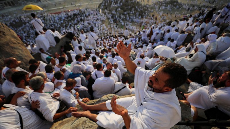 Muslim pilgrims pray on the Mount of Mercy outside the holy city of Mecca during the annual hajj pilgrimage in 2023