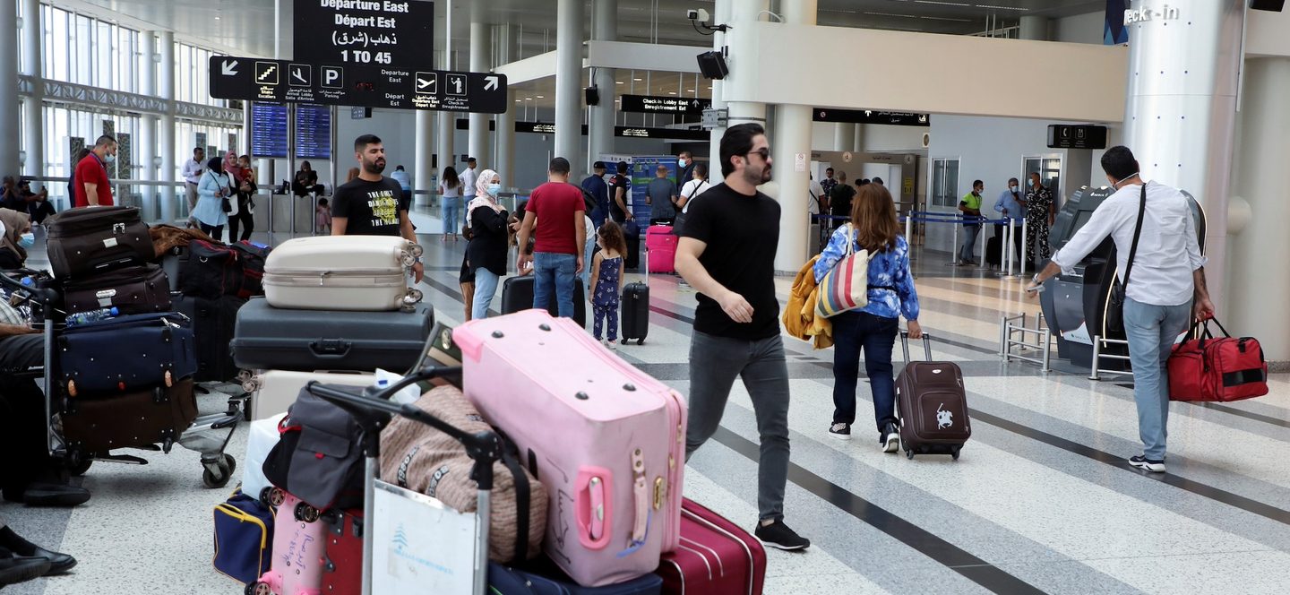 Passengers at Beirut international airport. Around 40% of Lebanon's GDP may be entering the country in cash in 'pockets and suitcases'