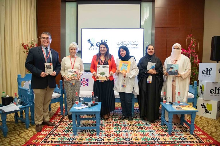 Ebtisam Al-Beiti, third from right, was able to leave her job to write full time but advises aspiring authors not to give up their day job