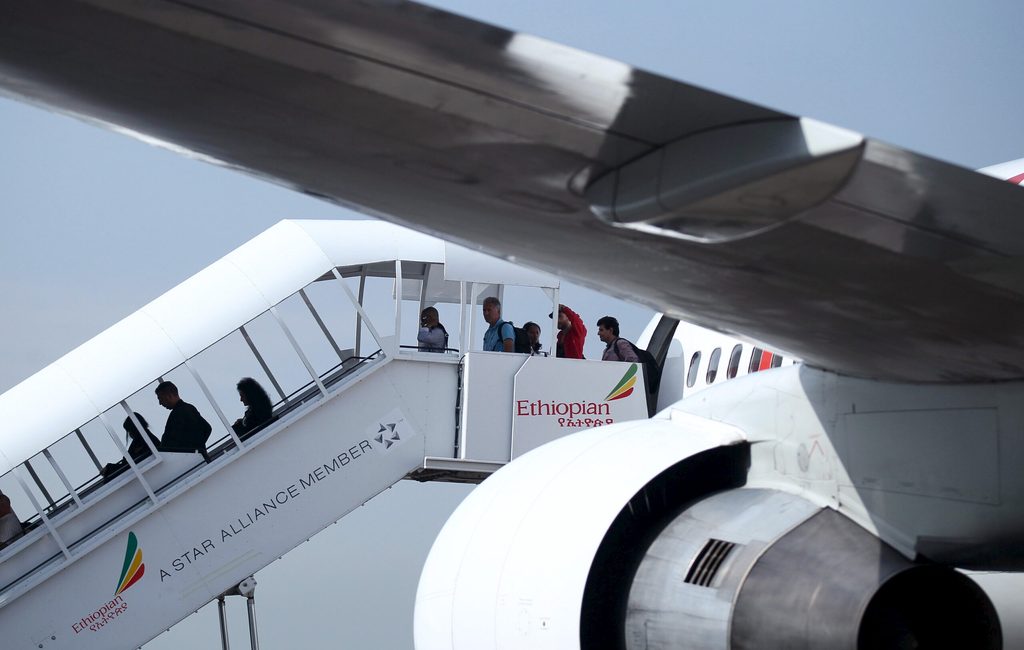 Africa airlines Ethiopian passengers disembarking Addis Ababa