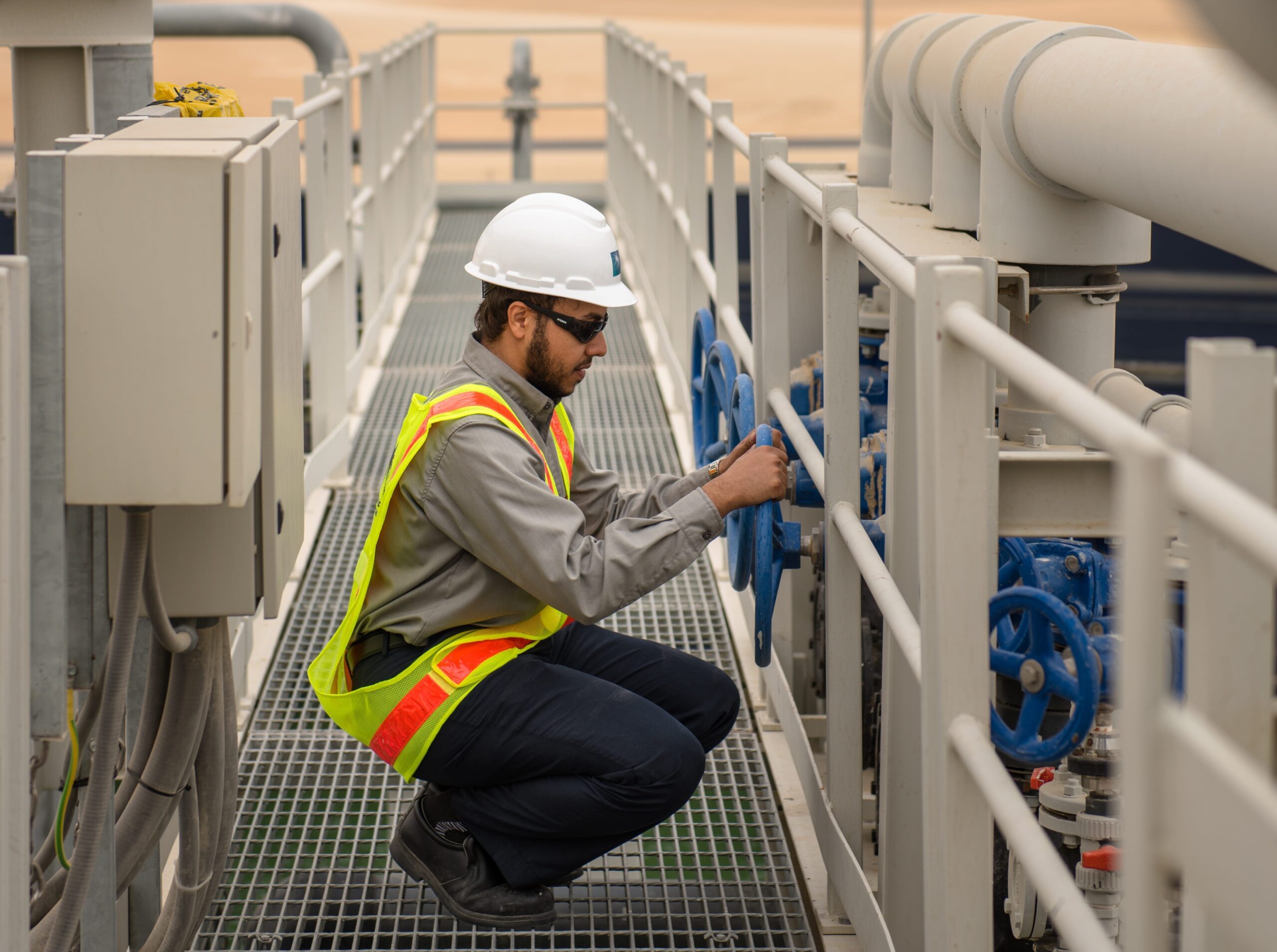 An employee at Aramco's Fadhili gas plant. The upgraded master gas system is intended to meet Saudi Arabia's growing domestic demand