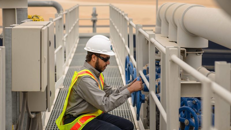 An employee at Aramco's Fadhili gas plant. The upgraded master gas system is intended to meet Saudi Arabia's growing domestic demand