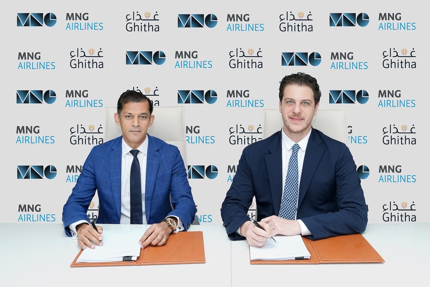 Falal Ameen, group CEO of Ghitha Holding and Murathan Doruk Günal, chairman of MNG Airlines, right, signing the deal