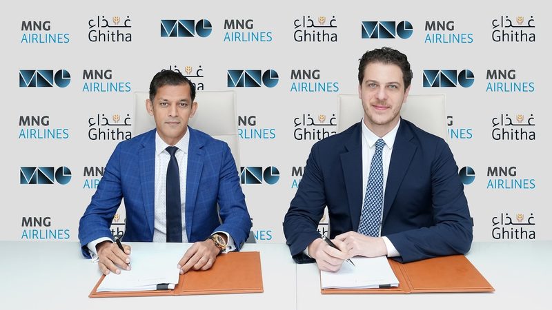 Falal Ameen, group CEO of Ghitha Holding and Murathan Doruk Günal, chairman of MNG Airlines, right, signing the deal