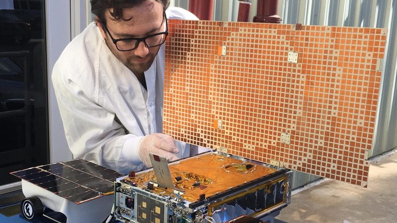 A NASA engineer tests a CubeSat's solar array. Small, modular CubeSats can help a range of Saudi monitoring programmes.