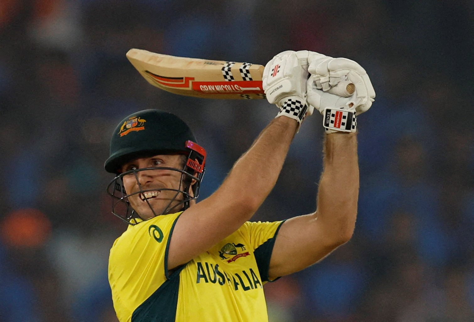 Helmet, Cricket, Cricket Bat Cricket - ICC Cricket World Cup 2023 - Final - India v Australia - Narendra Modi Stadium, Ahmedabad, India - November 19, 2023 Australia's Mitchell Marsh in action REUTERS/Adnan Abidi