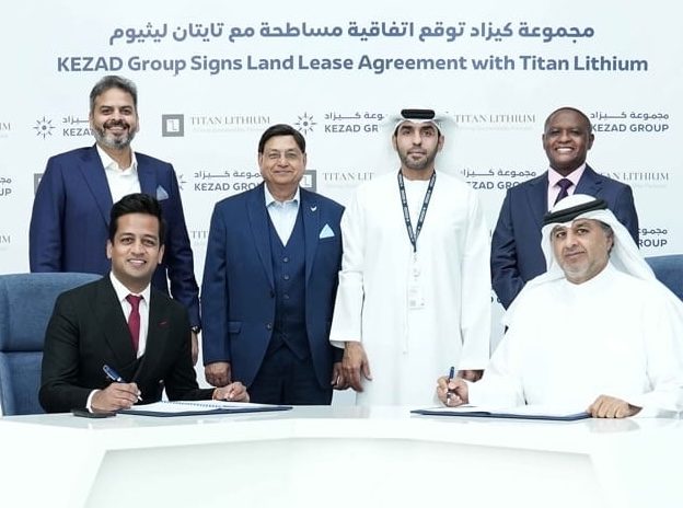 Kezad and Titan executives sign the deal for the lithium processing plant, described as a 'turning point' for the UAE's EV strategy