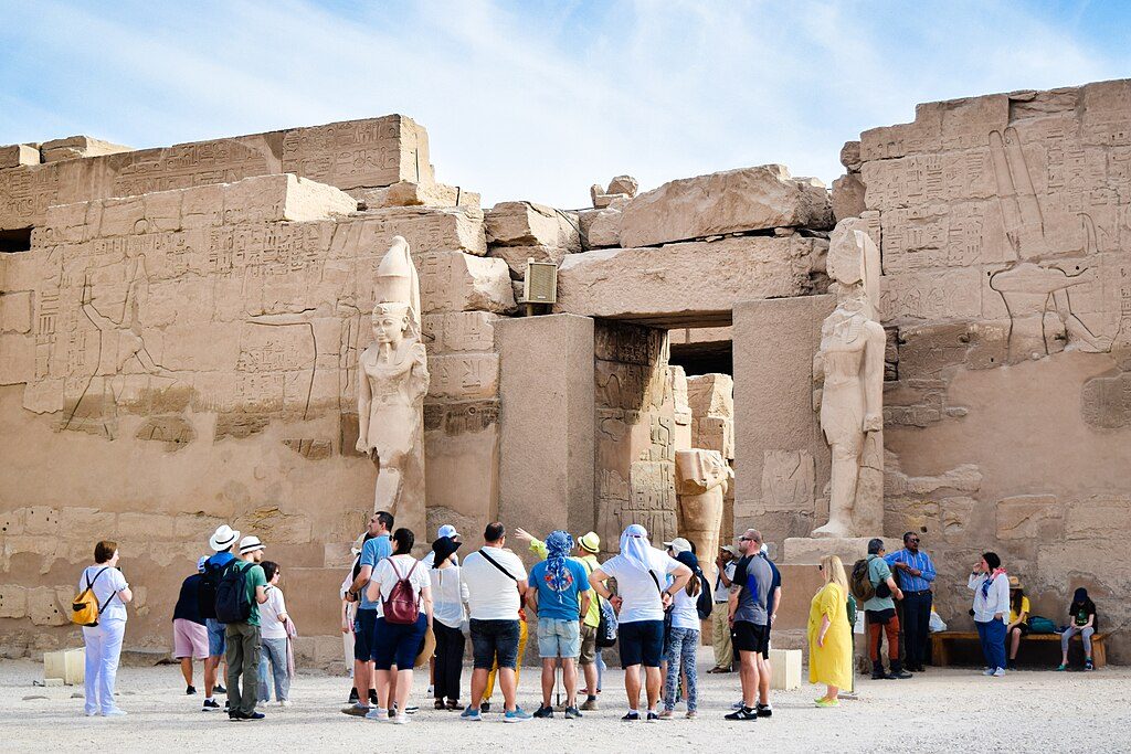 Visitors enjoy the Karnak Temples; the government hopes to entice 30 million tourists to Egypt a year by 2030 tourism egypt