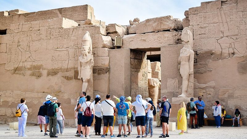 Visitors enjoy the Karnak Temples; the government hopes to entice 30 million tourists to Egypt a year by 2030 tourism egypt
