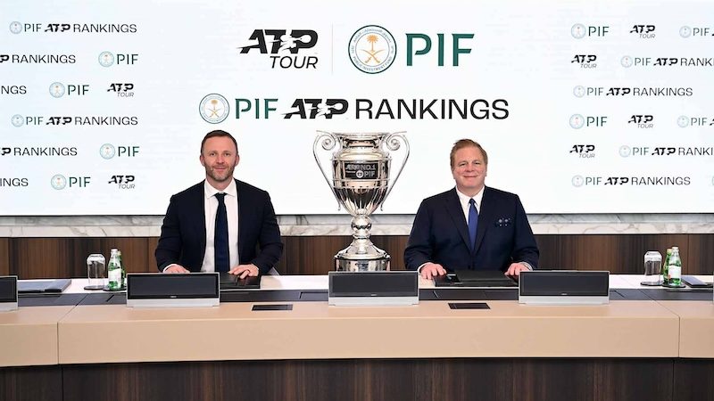 Crowd, Person, Adult ATP chief executive officer Massimo Calvelli and PIF head of corporate affairs Kevin Foster sign the sponsorship agreement