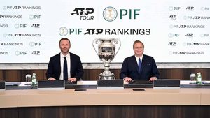 Crowd, Person, Adult ATP chief executive officer Massimo Calvelli and PIF head of corporate affairs Kevin Foster sign the sponsorship agreement