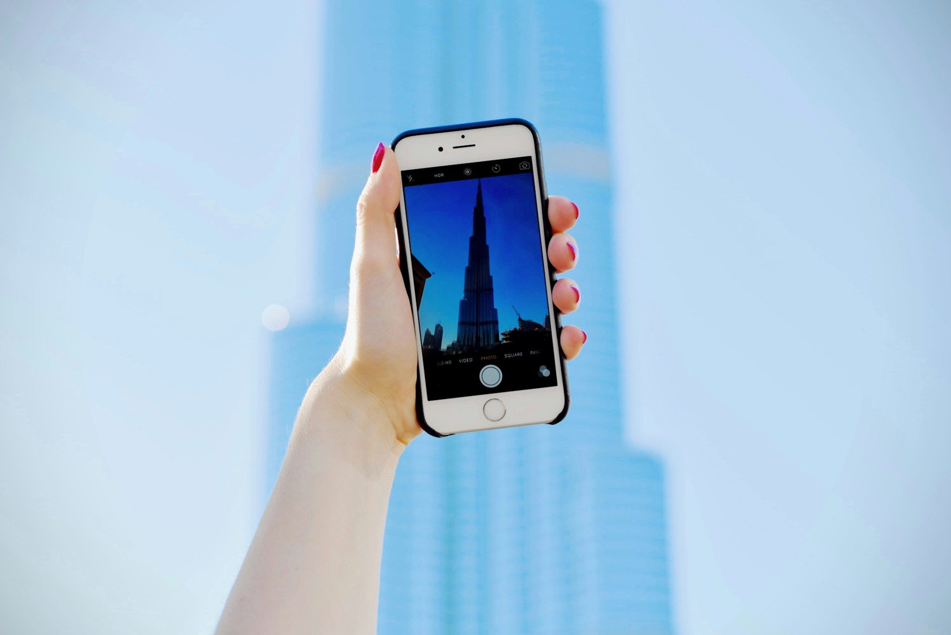 A mobile phone user in Dubai. The UAE has regions with poor connectivity, which Yahsat is hoping to improve