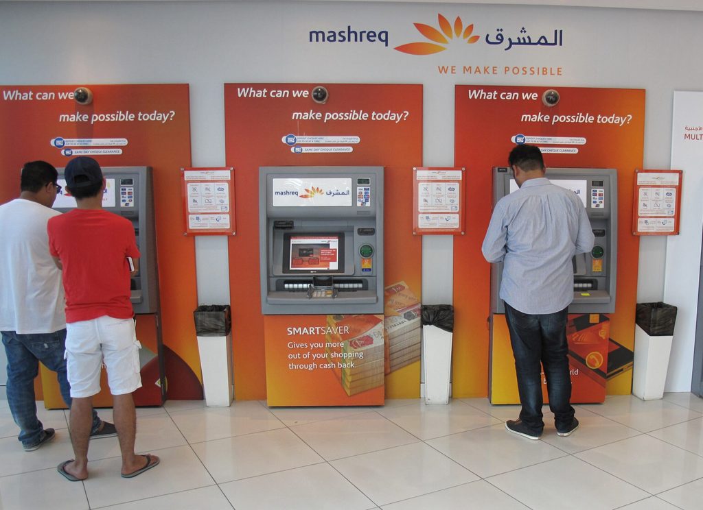 People using Mashreq Bank ATMs in Dubai. UAE banks’ combined net profit was a record AED 76.9bn in 2023