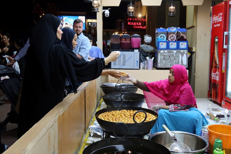 Women buy sweets at a dessert shop in Dubai during Ramadan. Retailers have shrugged off reports of a possible drop in spending