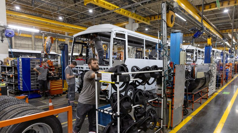 Technicians working for Otokar, a maker of heavy commercial and military vehicles, on the production line at a factory in Sakarya, Turkey