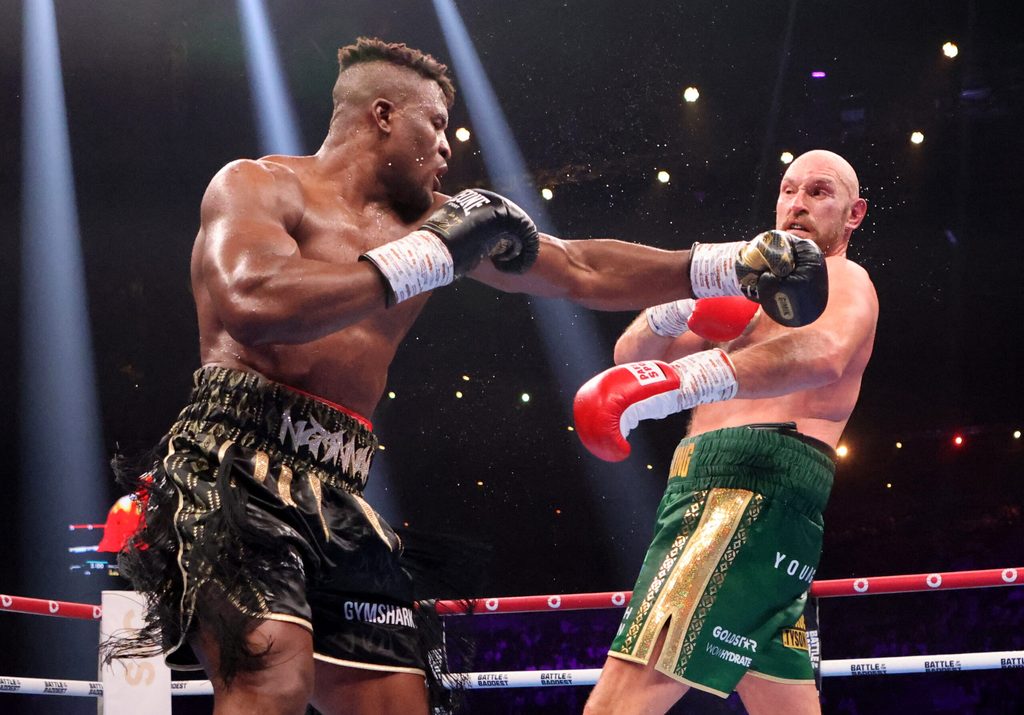 Francis Ngannou (left) fighting Tyson Fury in Riyadh last year for the heavyweight title
