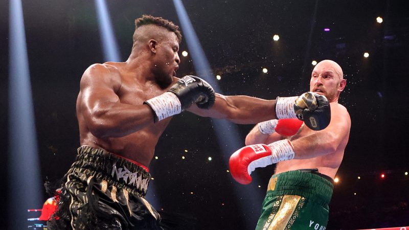 Francis Ngannou (left) fighting Tyson Fury in Riyadh last year for the heavyweight title