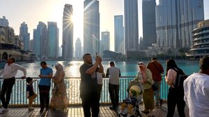 Tourists at Lake Burj Khalifa in Dubai. Businesses are confident that growth will continue throughout 2024