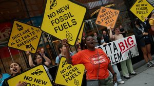 Climate activists outside BlackRock's New York HQ. The company says it wants to focus on 'transition investing'