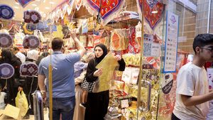 Person, Shopping, Adult A Saudi woman shops for Ramadan decorations to mark the beginning of the Holy Month of Ramadan in a local market in Riyadh, Saudi Arabia, March 22, 2023. REUTERS/Ahmed Yosri