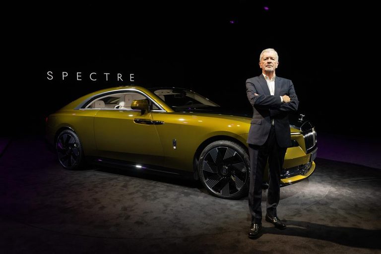 Not the next CEO: Frank Kane with the first electric Rolls Royce, the Spectre, in 2022