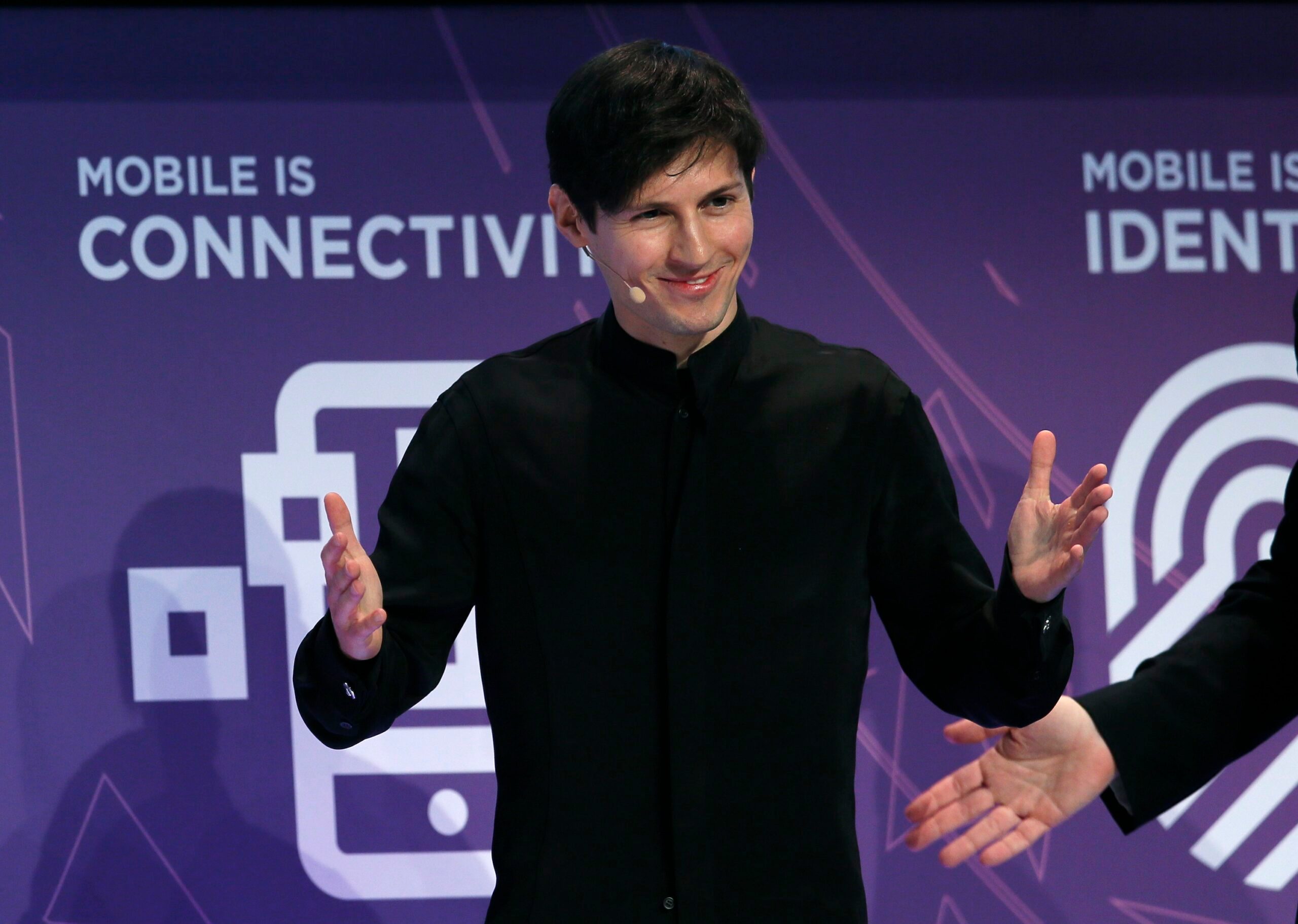 Body Part, Finger, Hand Founder and CEO of Telegram Pavel Durov delivers a keynote speech during the Mobile World Congress in Barcelona, Spain February 23, 2016. REUTERS/Albert Gea