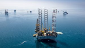 Drilling rigs in Saudi Arabia's Hasbah field. The country's GDP contracted by 0.8% in 2023