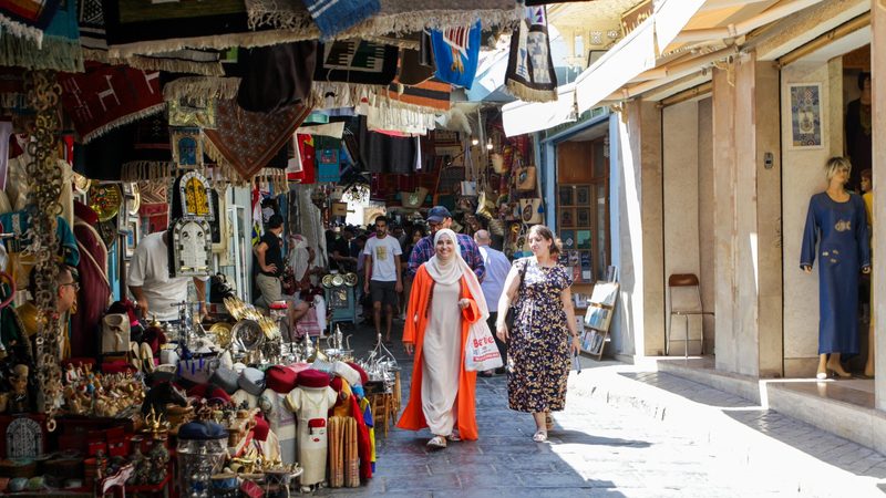 People are seen out shopping in the old city of Tunis, Tunisia, 23 August 2023. Tunisia's Ministry of Tourism and Handicrafts has officially restarted tourism in the country after the challenges caused by COVID-19 in 2020. Up to 10 August 2023, a total of 5.4 million tourists have picked Tunisia for their vacations (Photo by Yassine Mahjoub/NurPhoto)NO USE FRANCE
