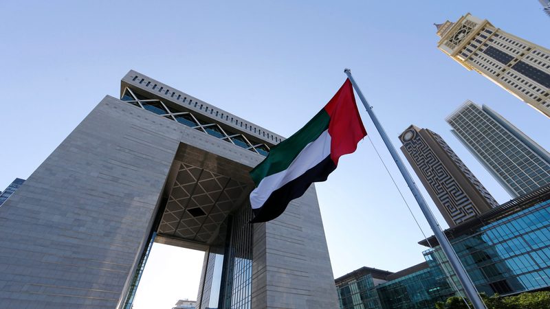The UAE flag flies at the Dubai International Finance Centre. Removal from the grey list should increase investors' trust in the UAE and draw FDI