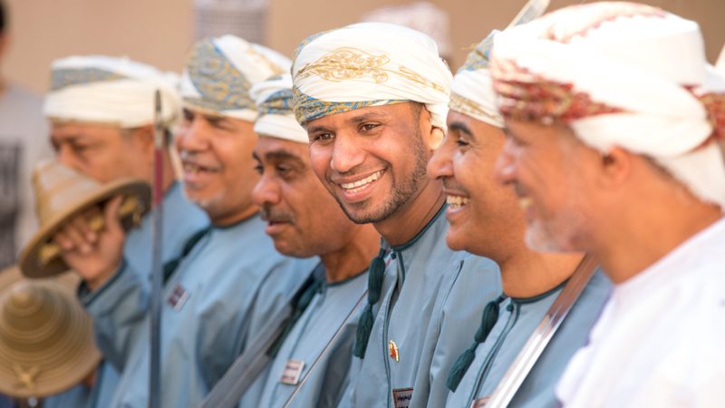 People celebrating on Oman's national day. The sultanate's $47 billion sovereign wealth fund aims to privatise several dozen state-owned companies