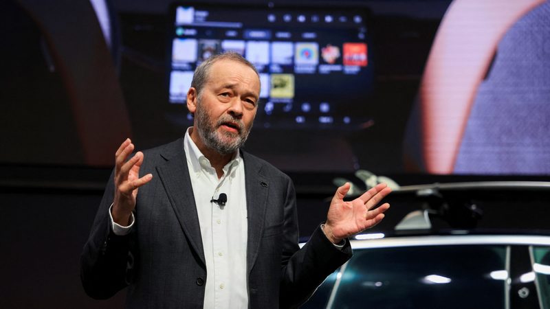 Lucid Group CEO Peter Rawlinson at the Los Angeles Auto Show. The company announced a 40% year-on-year sales increase