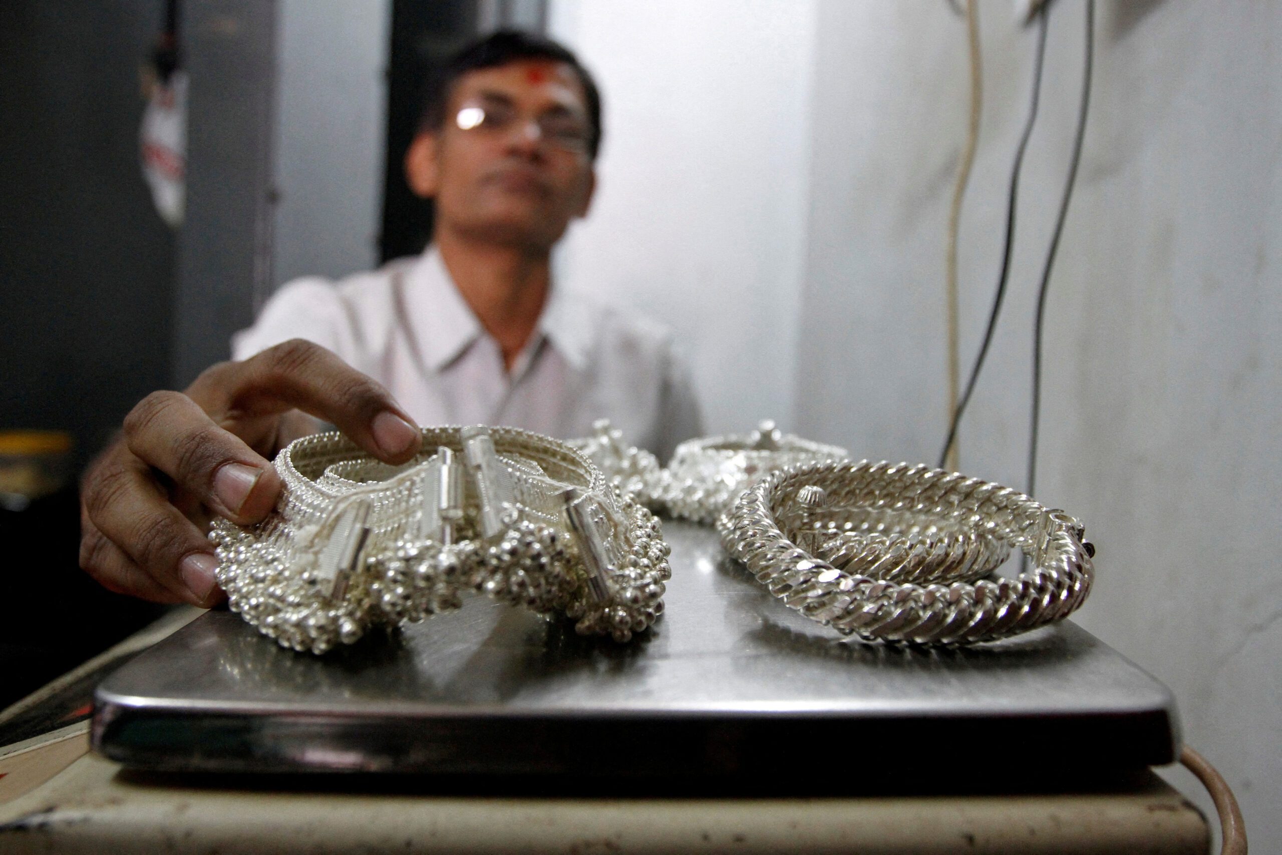 A silver trader in his shop in Ahmedabad, India. India is sourcing an increasing amount of its silver from the UAE