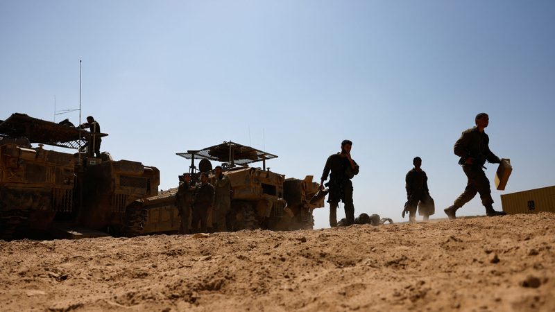 Israeli soldiers near the Israel-Gaza border. Further escalation of the conflict could have global economic ramifications