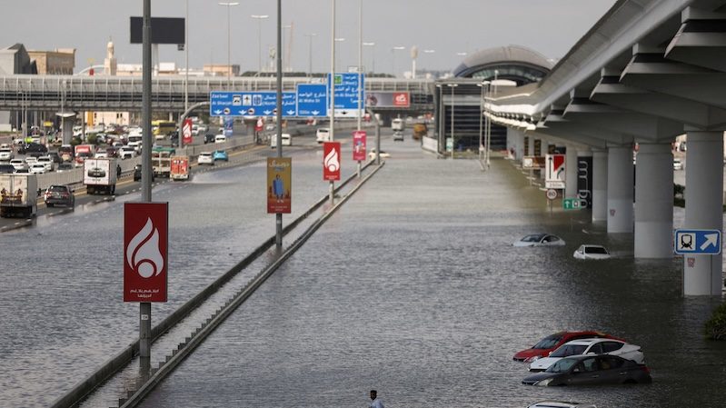 Abandoned cars on a flooded road in Dubai