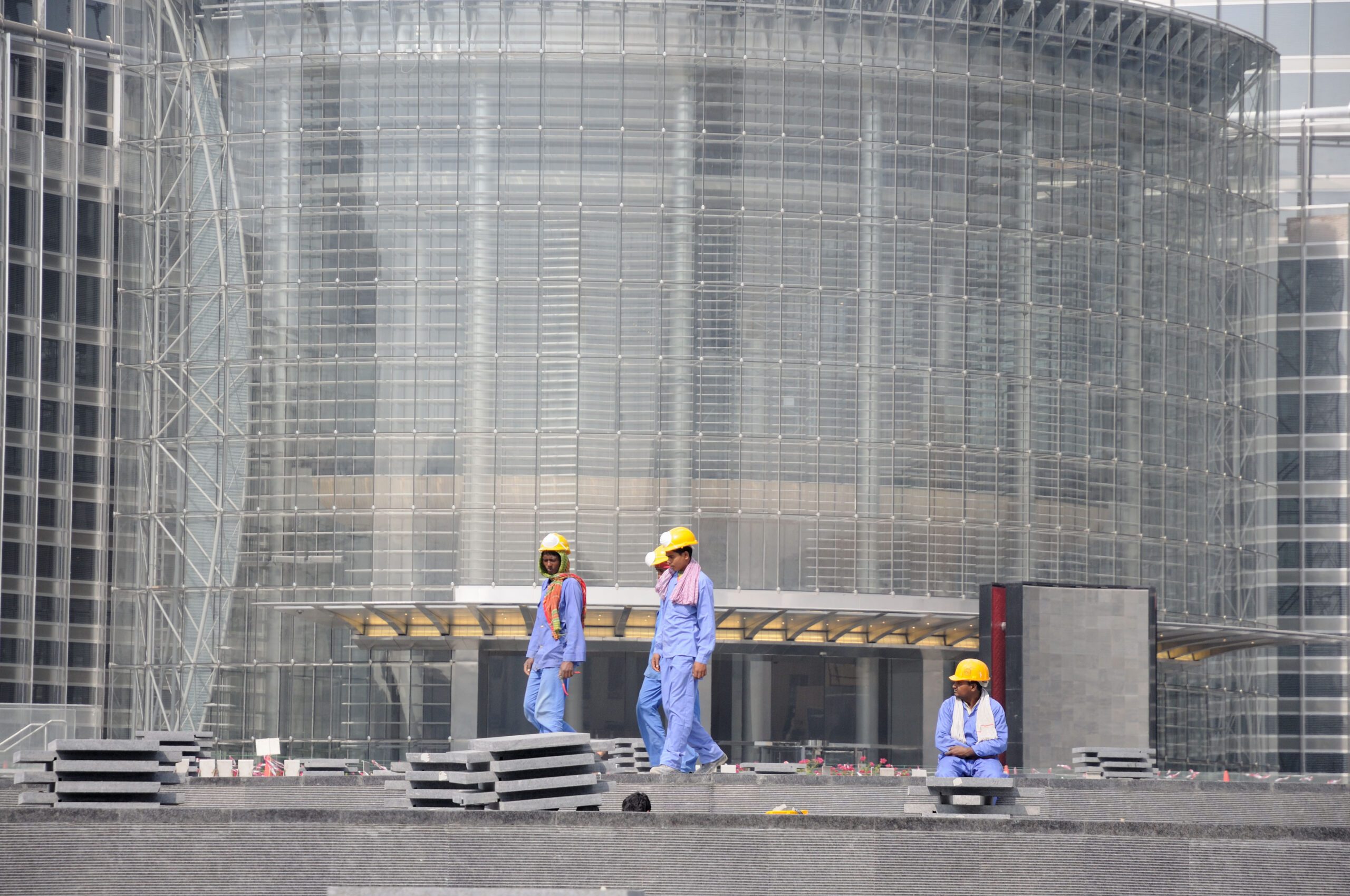 Construction workers in Dubai. The sector is suffering less from payment delays that affect other Gulf states