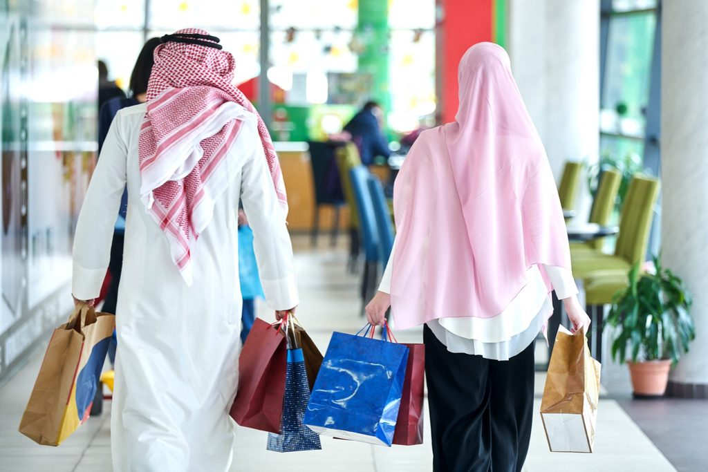 Cenomi executives hope to attract shoppers who might otherwise spend abroad by offering a 'world class' experience Young muslim couple shopping and having fun