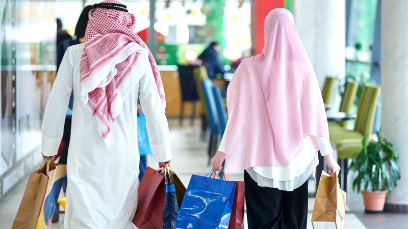 Cenomi executives hope to attract shoppers who might otherwise spend abroad by offering a 'world class' experience Young muslim couple shopping and having fun