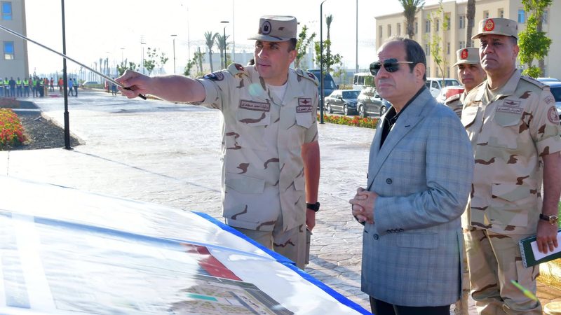 President Sisi, a former field marshal, inspects a military academy. Egypt's armed forces are significant players in several economic sectors