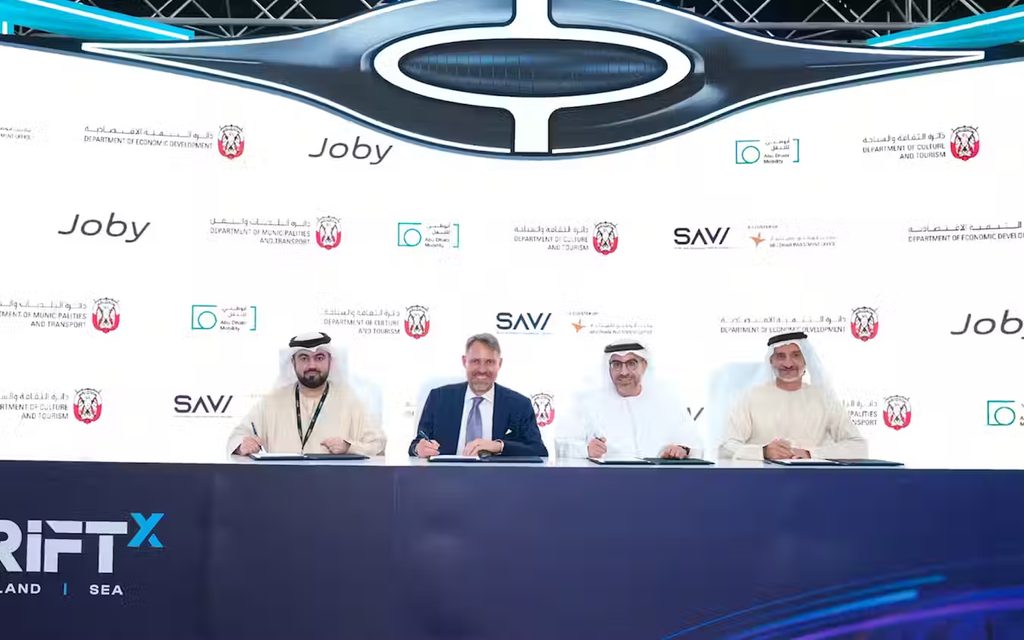 Joby Aviation's CEO JoeBen Bevirt (2nd left) at the signing of a multilateral agreement with the three Abu Dhabi government departments