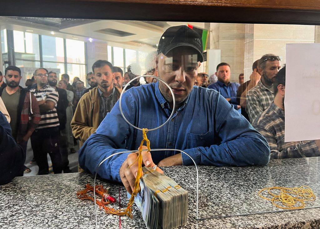 Libyan-Investment-Authority man in bank in Libya