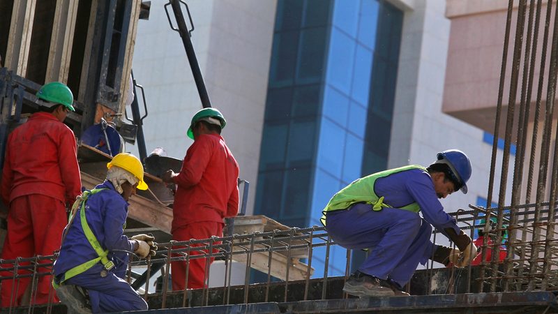 Foreign labourers work at the construction site of a building in Riyadh Foreign workers on a building site in Riyadh; thousands of migrants who have the right to work in Saudi Arabia could have their work permit fees covered for four years from the date of recognition
