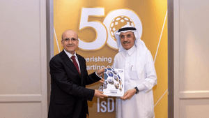 Turkey's treasury and finance minister Mehmet Şimşek and IsDB president Muhammad Al Jasser at the IsDB annual general meeting in Riyadh