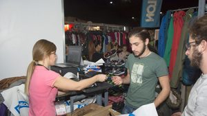 A customer paying with a credit card inside the Black Friday Market in Beirut. Lebanon wants more people to move away from cash