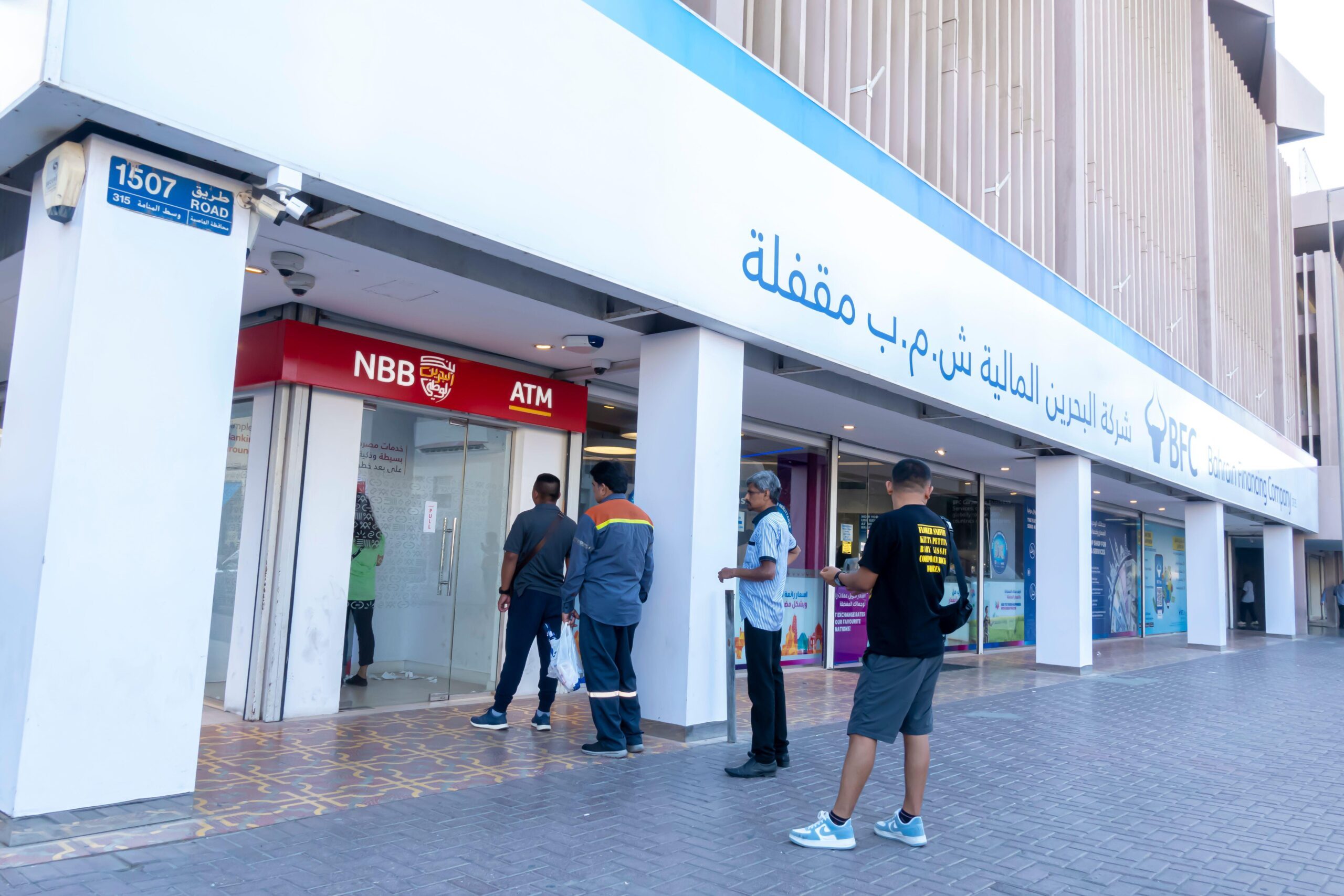 Customers queue for the National Bank of Bahrain. A merger of NBB and Bank of Bahrain and Kuwait would be in the top 30 of GCC entities