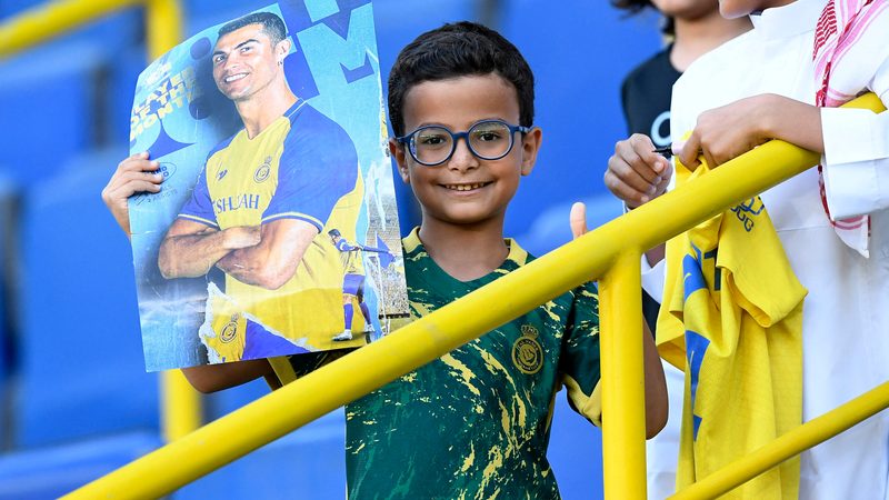 A young Cristiano Ronaldo fan pictured at an Al Nassr Saudi Pro League match. The star has approximately 849 million social media followers