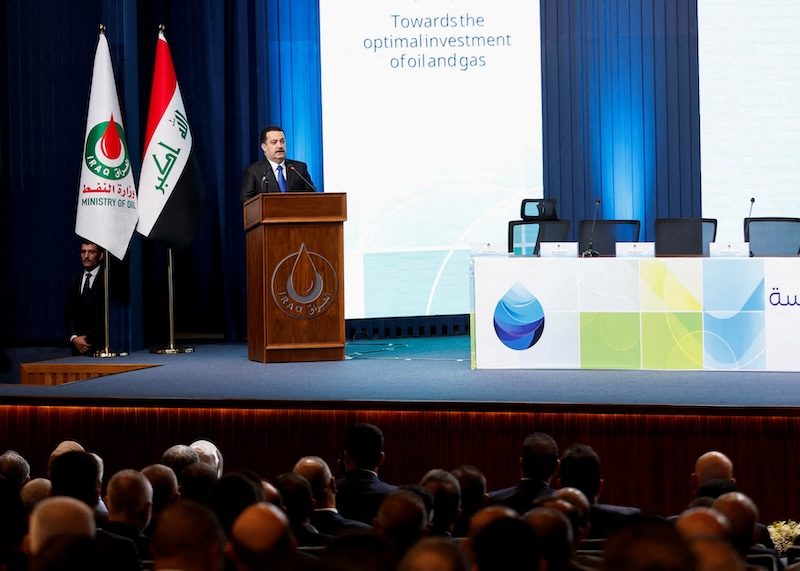 Iraqi prime minister Mohammed Shia Al-Sudani attends licensing rounds for 29 oil and gas exploration blocks at the oil ministry's headquarters in Baghdad
