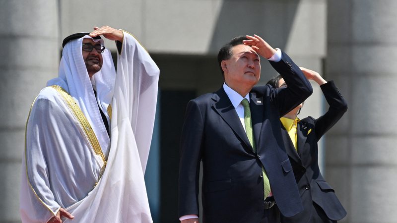 United Arab Emirates President Sheikh Mohamed bin Zayed Al Nahyan, South Korean President Yoon Suk Yeol and his wife Kim Keon Hee watch the Black Eagles, the aerobatic team of T-50 jets belonging to South Korea's air force, during a welcoming ceremony at the Presidential Office in Seoul on May 29, 2024. JUNG YEON-JE/Pool via REUTERS