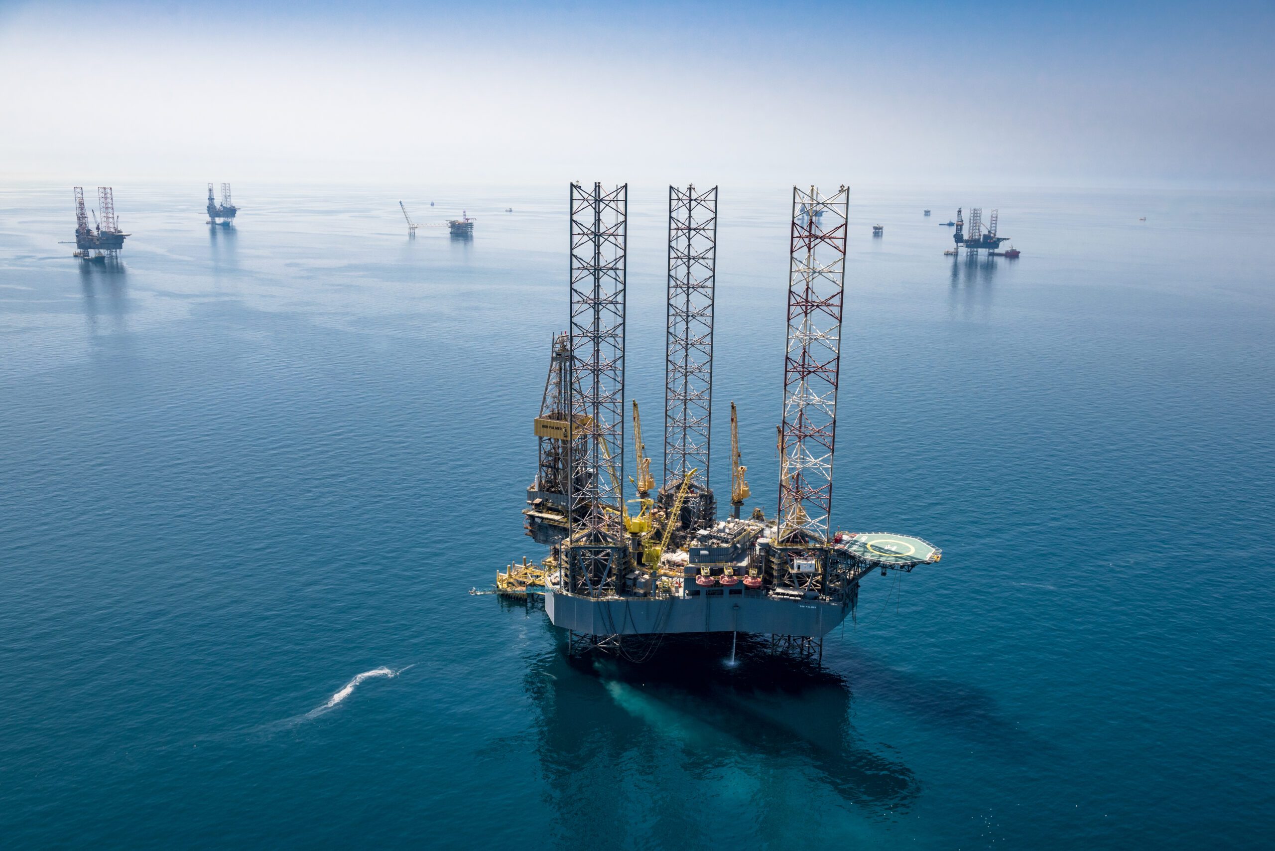 Aramco rigs in the Hasbah oil field. It uses AI for oil exploration and underwater operations