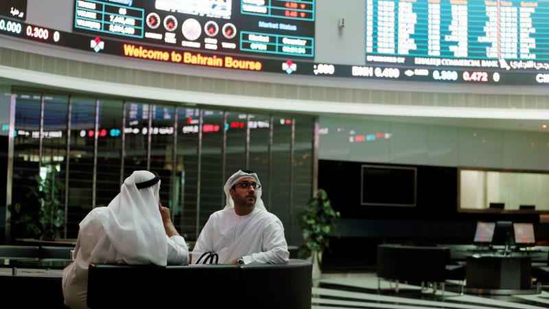 Traders look at the screens at Bahrain Bourse in Manama, Bahrain, February 7, 2018. REUTERS/Hamad I Mohammed